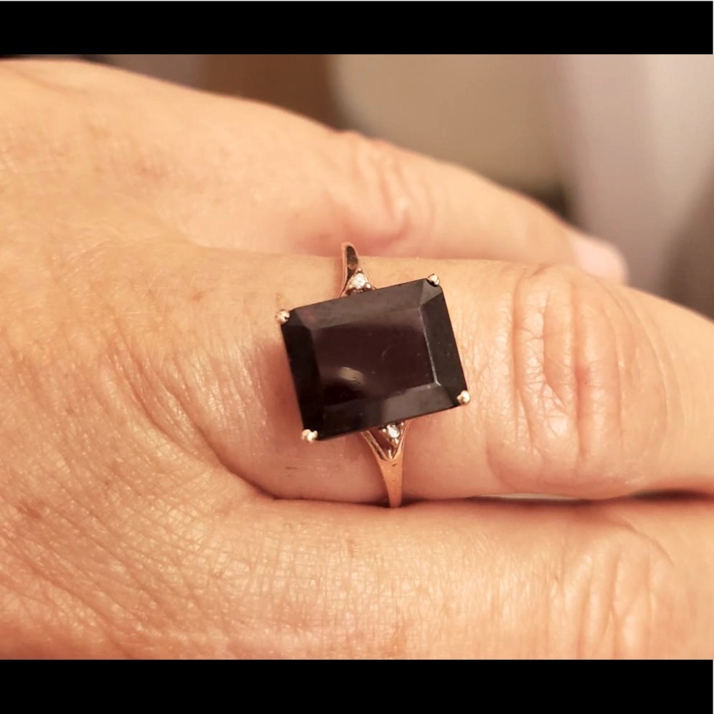 10k rose gold with 2 carat garnet stone & 2 small pave diamonds